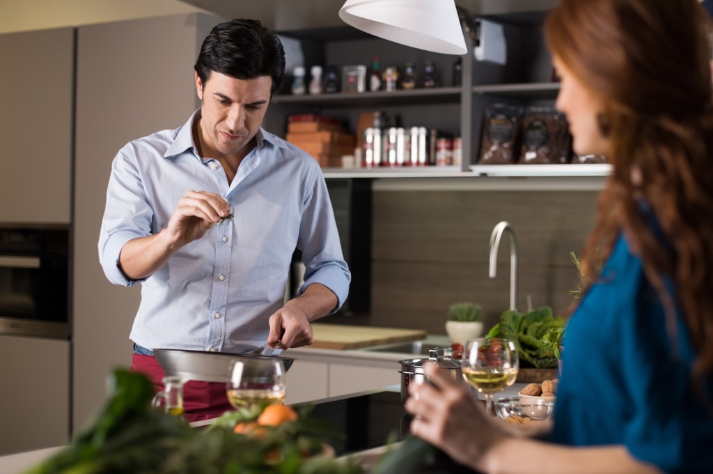 Cooking with your partner and having fun doing it