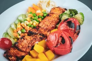 Skewers and vegetables Photo by Sam Moqadam on Unsplash
